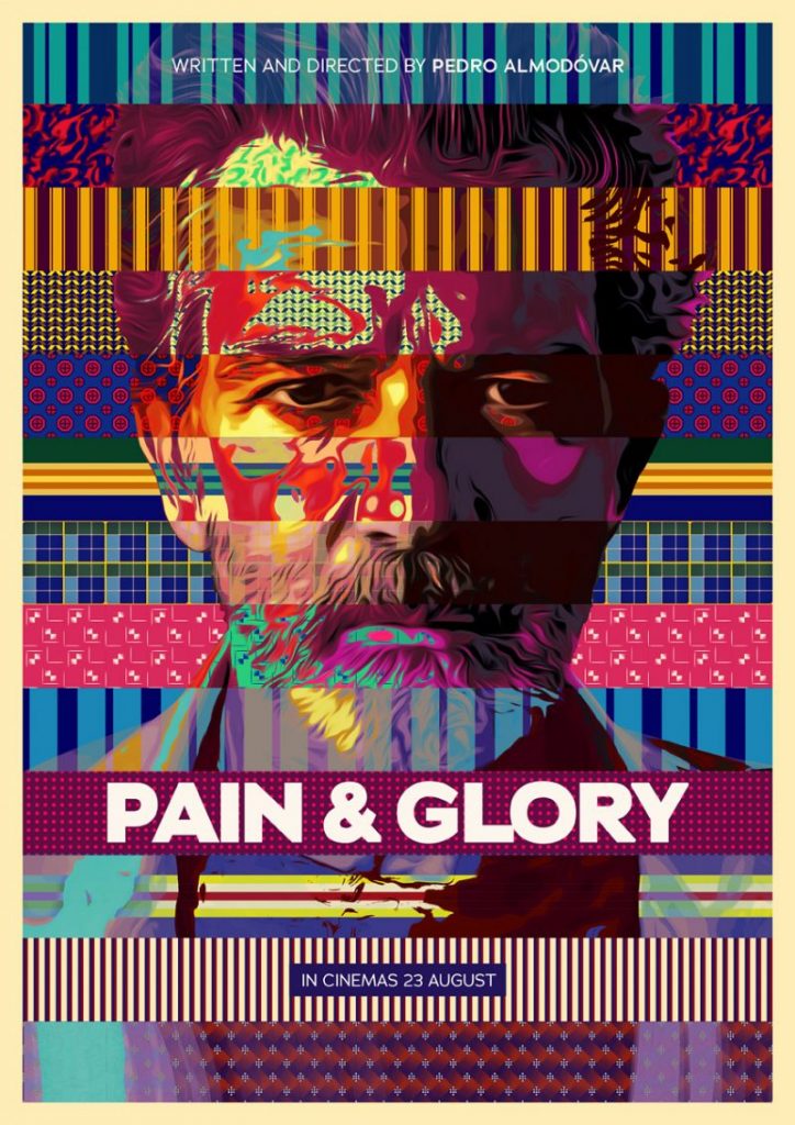Poster for Pain & Glory. Patterned strips of contrasting colors that look like wallpaper cross the poster horizontally, forming the image of a bearded, middle-aged man who stares out past the viewer.